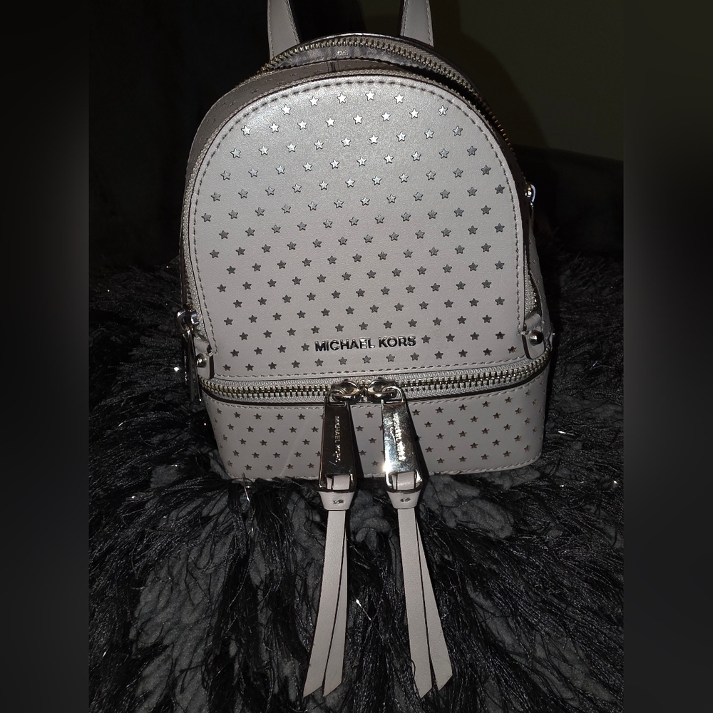 Michael Kors Pearl Gray Star Cutout Women's Rhea Mini Backpack